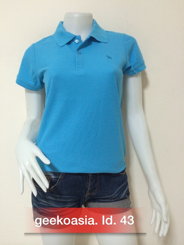 เสื้อโปโลสีพื้นหญิง ฟ้ากลาง