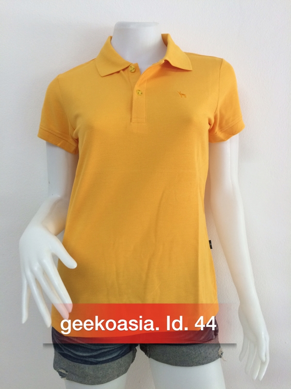 เสื้อโปโลสีพื้นหญิง เหลืองทอง 