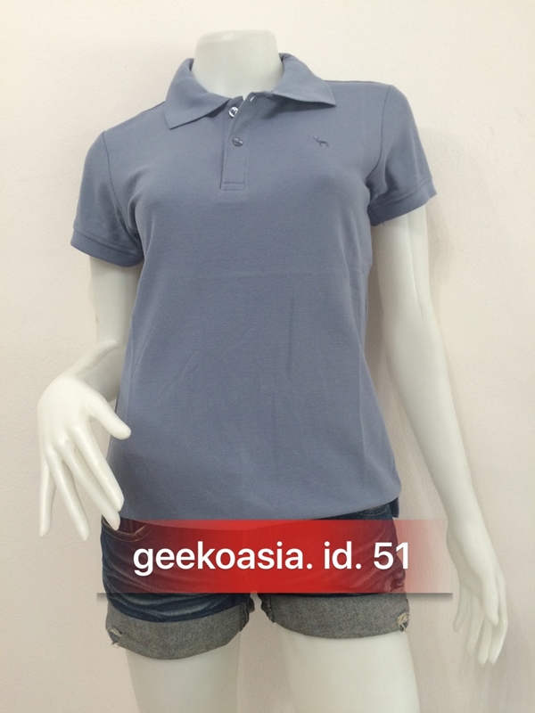เสื้อโปโลสีพื้นหญิง เทาอากาศ 